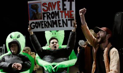 Photo of people chanting near Area 51