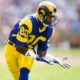 Photo of Henry Ellard preparing to catch a football in a Los Angeles Rams uniform