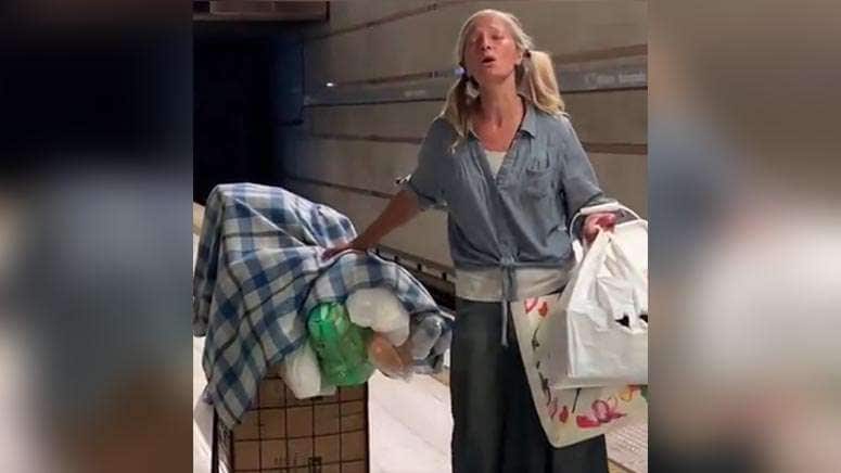 Photo of homeless subway singer