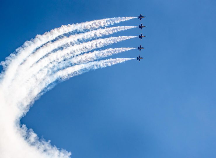 Blue Angels climb to 10,000 feet as they execute their Line Abreast Loop manuever.