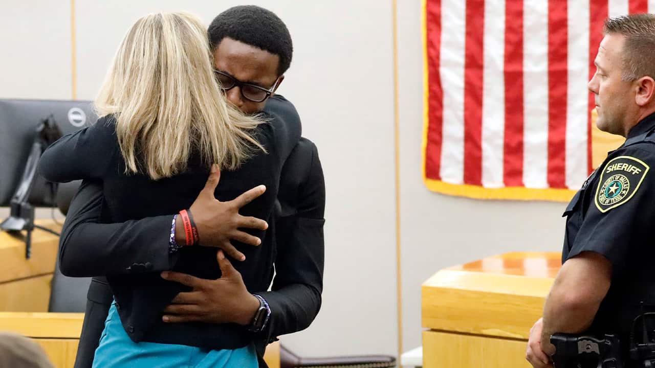 Photo of Amber Guyger hugging Brandt Jean