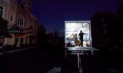 Photo of Armando Espinoza delivering paper products to a cafe in Sonoma, CA
