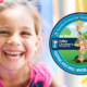 Photo of a smiling girl and logo for Valley Children's new center to promote children's health
