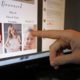 Photo of Austin Cloes pointing to relatives who were killed in Mexico