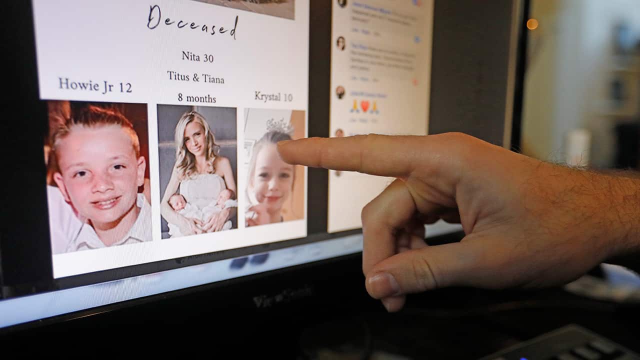 Photo of Austin Cloes pointing to relatives who were killed in Mexico