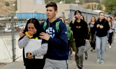 Photo of students being escorted out of Saugus High School