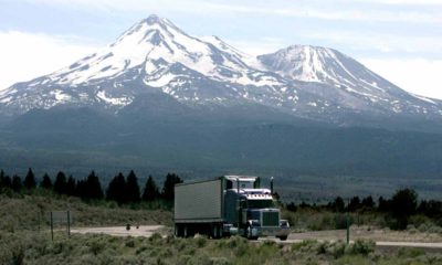 Photo of a big-rig on the road near Mount Shasta