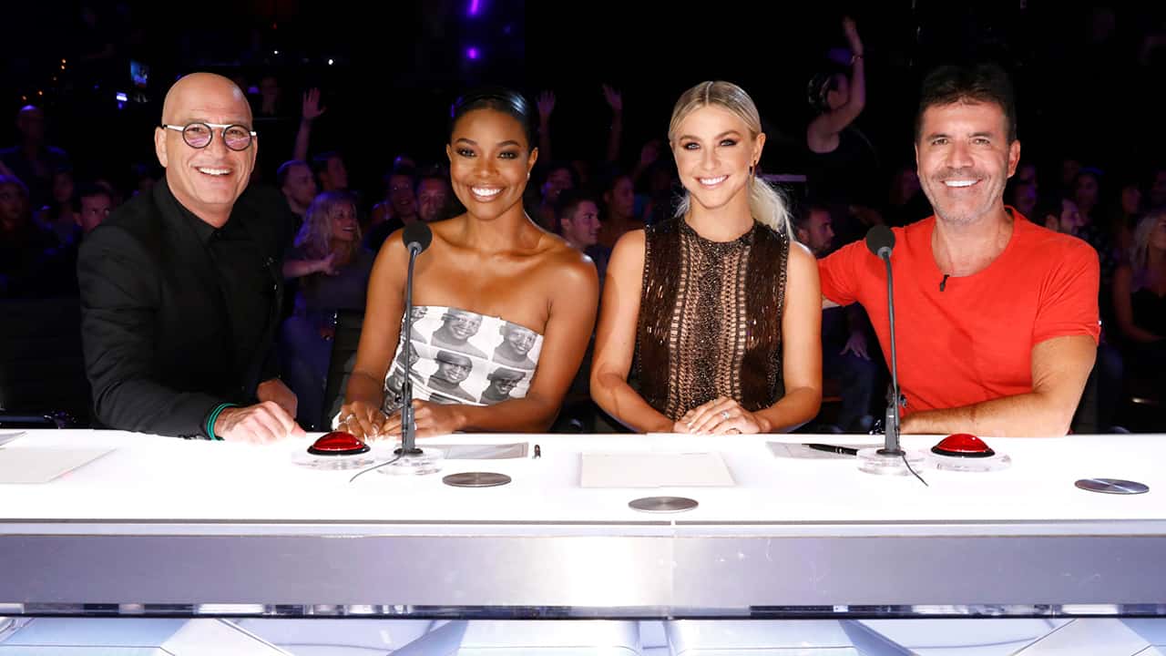 Photo of Howie Mandel, Gabrielle Union, Julianne Hough, Simon Cowell on the set of "America's Got Talent"