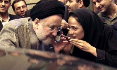 Photo of outgoing reformist Iranian President Mohammad Khatami talking on the phone