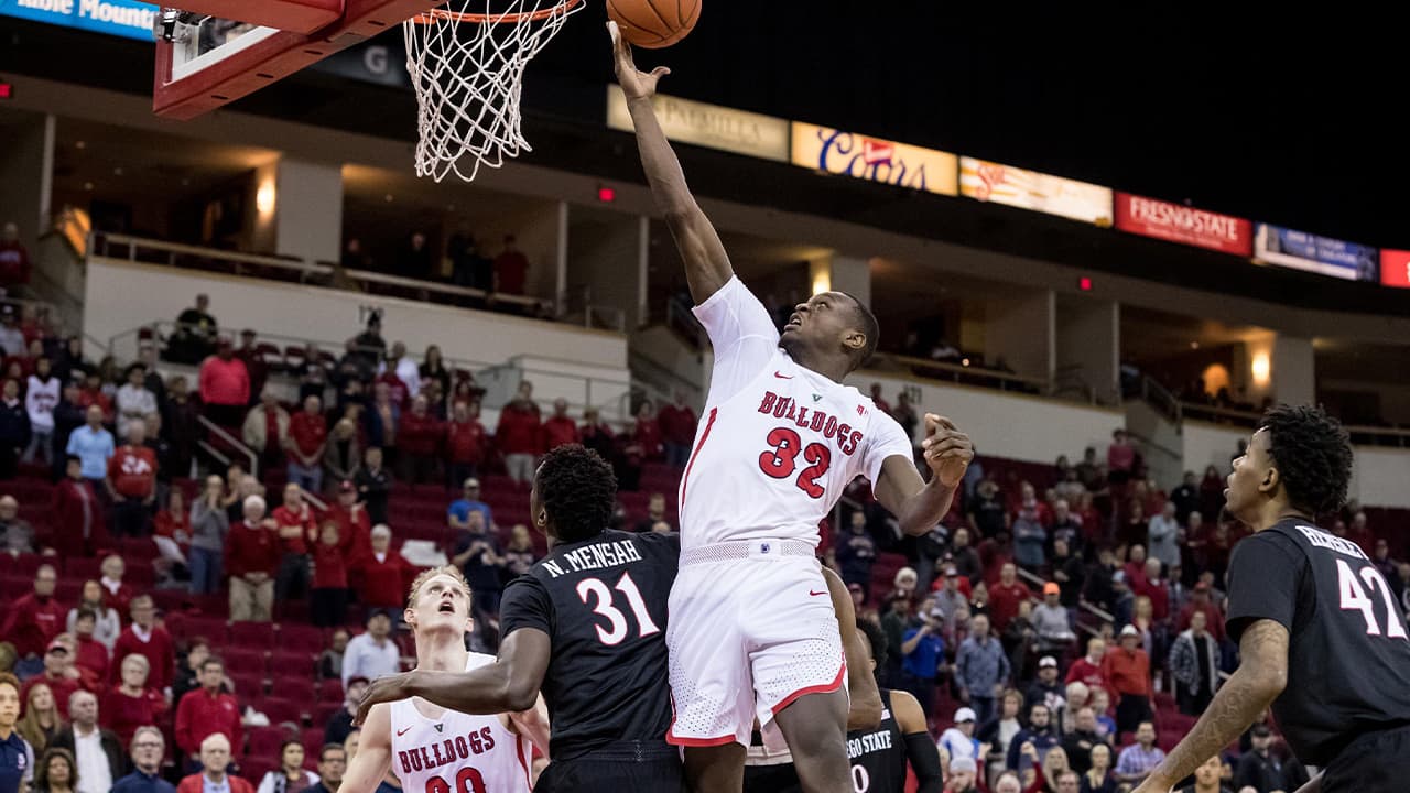 Photo of a leaping Nate Grimes