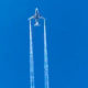 Photo of a plane flying in the sky