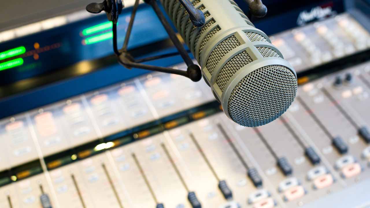 Photo of a Radio Station Microphone and Mixer