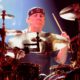 Photo of Neil Peart of the band Rush performing in concert