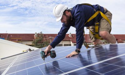Solar panels being installed on a home.