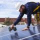 Solar panels being installed on a home.