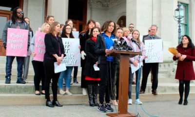 Photo of Alanna Smith speaking during a news conference