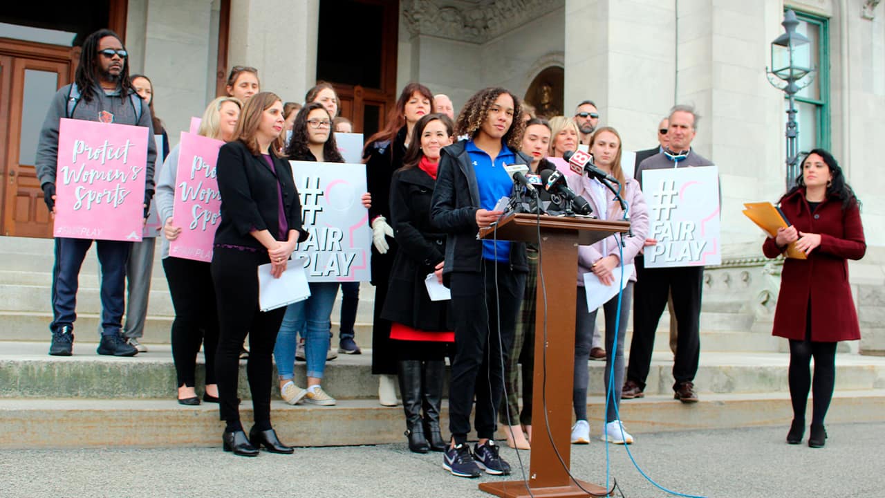 Photo of Alanna Smith speaking during a news conference