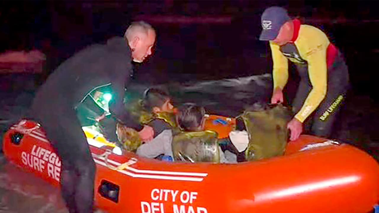 Photo of the rescue of people from an immigrant smuggling boat