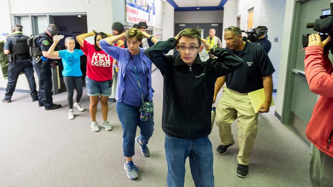 Photo of students taking part in an Active Shooter Response Training exercise at Fountain Middle School in Fountain, Colo.