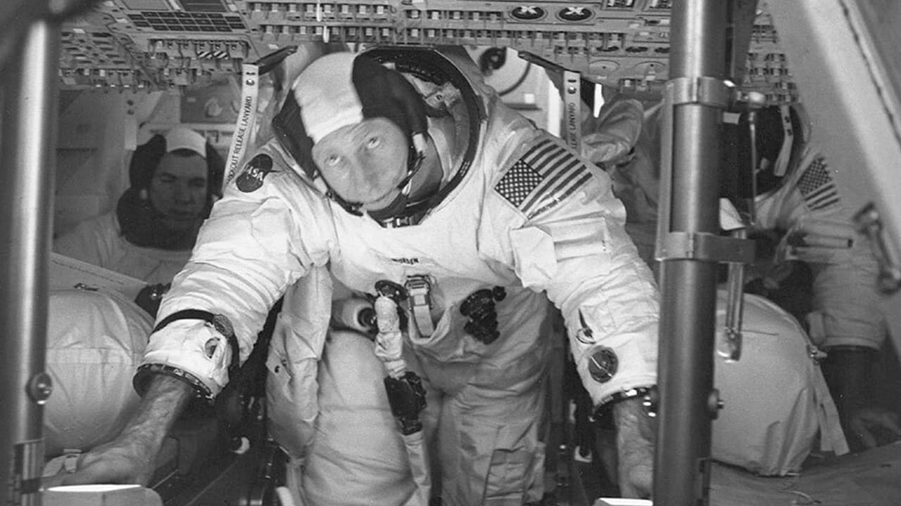 Photo of astronauts Al Worden, center, Dave Scott, left, and Jim Irwin in the Command Module for an altitude chamber test at Cape Canaveral, Fla.