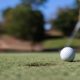 Photo of a man playing golf