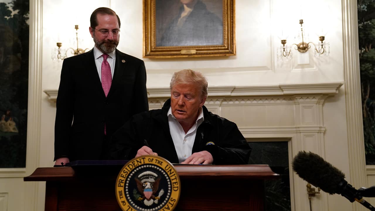 Photo of President Donald Trump signing an $8.3 billion bill to fight the coronavirus outbreak in the U.S.