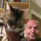 Photo of Chris Platzer, a planning commissioner for Vallejo, Calif. holding his cat