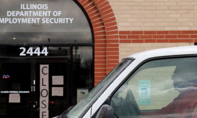Photo of the closed sign in front of Illinois Department of Employment Security in Chicago