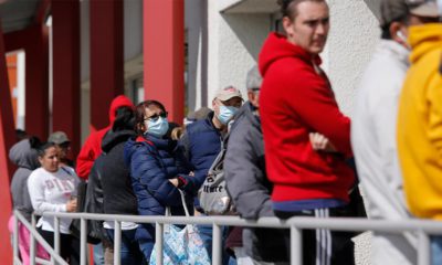Photo of people waiting in line for help with unemployment in Las Vegas