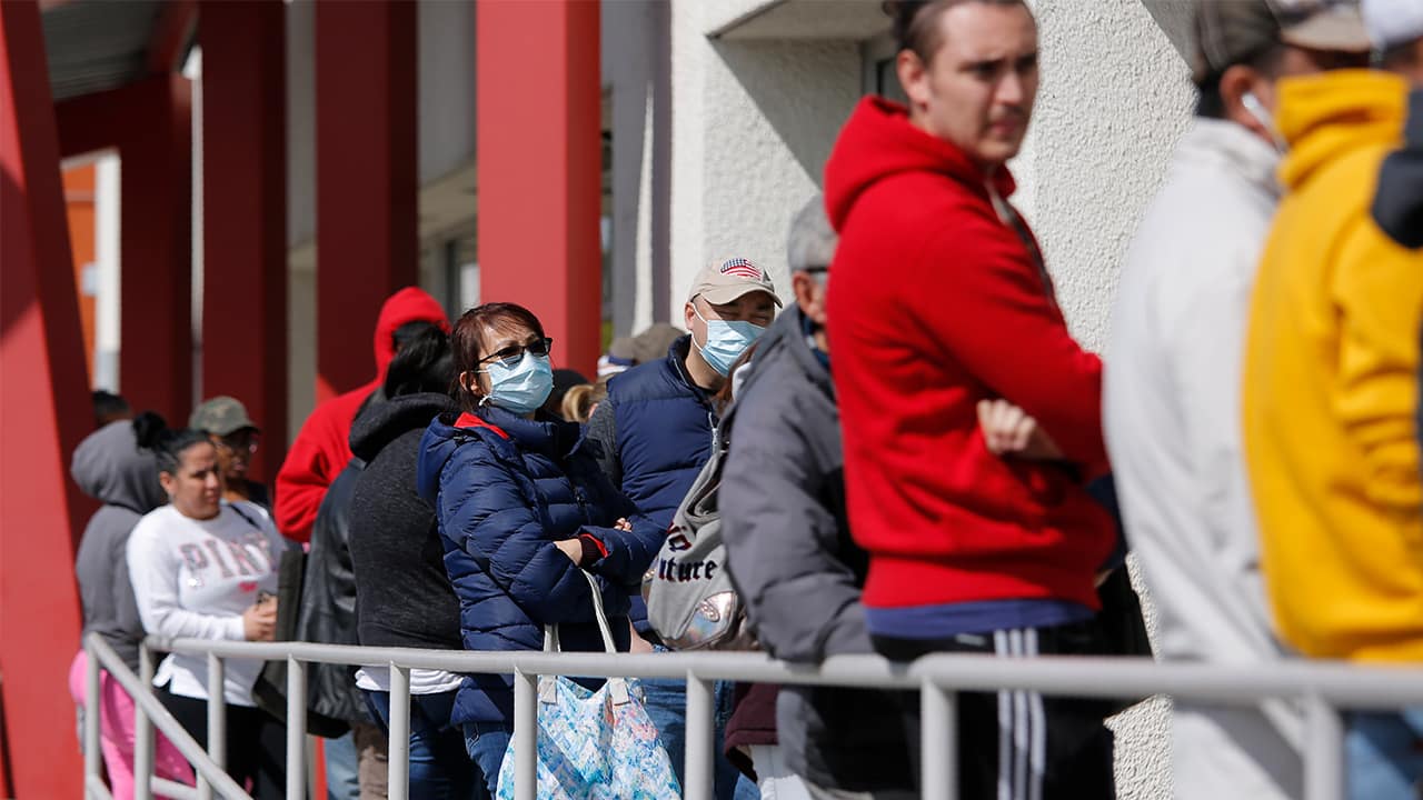 Photo of people waiting in line for help with unemployment in Las Vegas