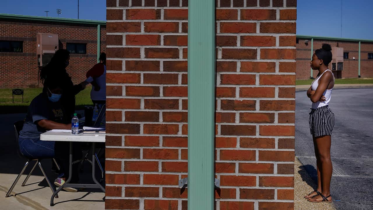 Photo of students waiting in line