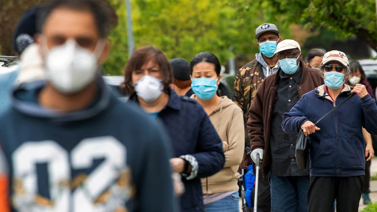 Photo of people wearing face masks