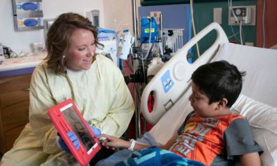 Photo of a child life team member and a Valley Children's Hospital patient