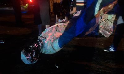 Photo of a toppled Jefferson Davis statue