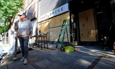 Photo of Johnny Grimes outside of his salon