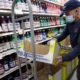 Photo of Juan Santos stocking shelves