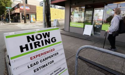 Photo of a now hiring sign