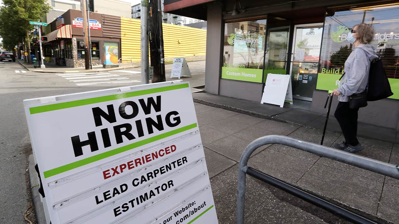 Photo of a now hiring sign