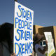 Image of people protesting child trafficking in Fresno, California