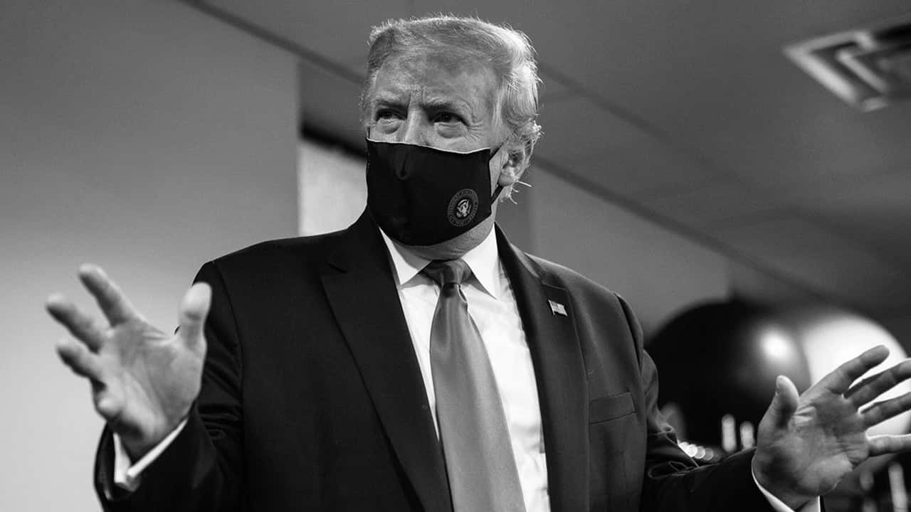 Black and white image of President Donald Trump wearing a mask